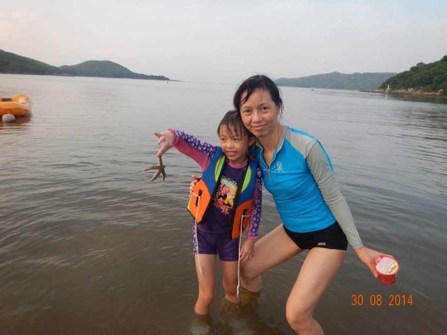 Me as a kid holding my first starfish in Hong Kong