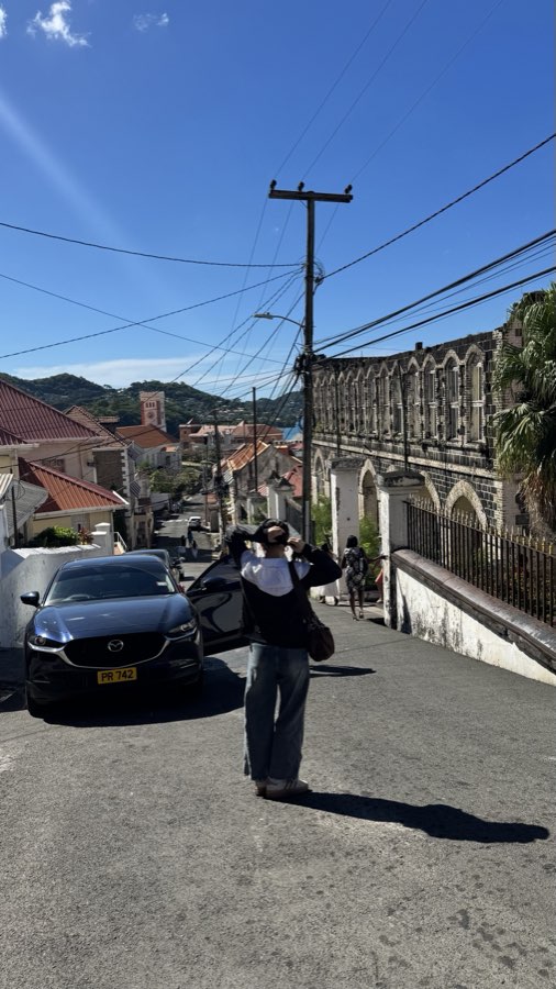 Looking down a steep street toward the harbour in Grenada