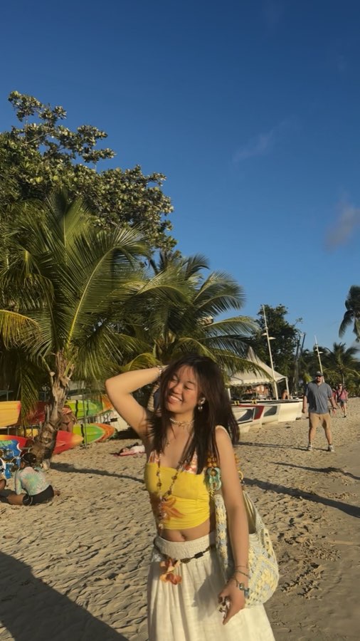 Laughing on a sunny beach in Guadeloupe