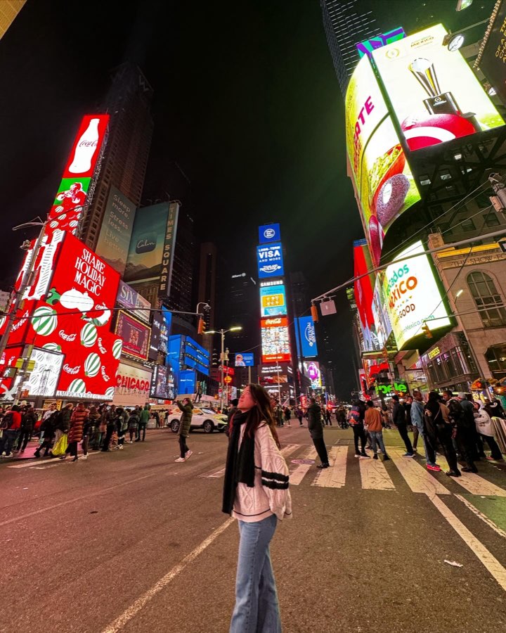 Standing in Times Square at night after watching Phantom of the Opera